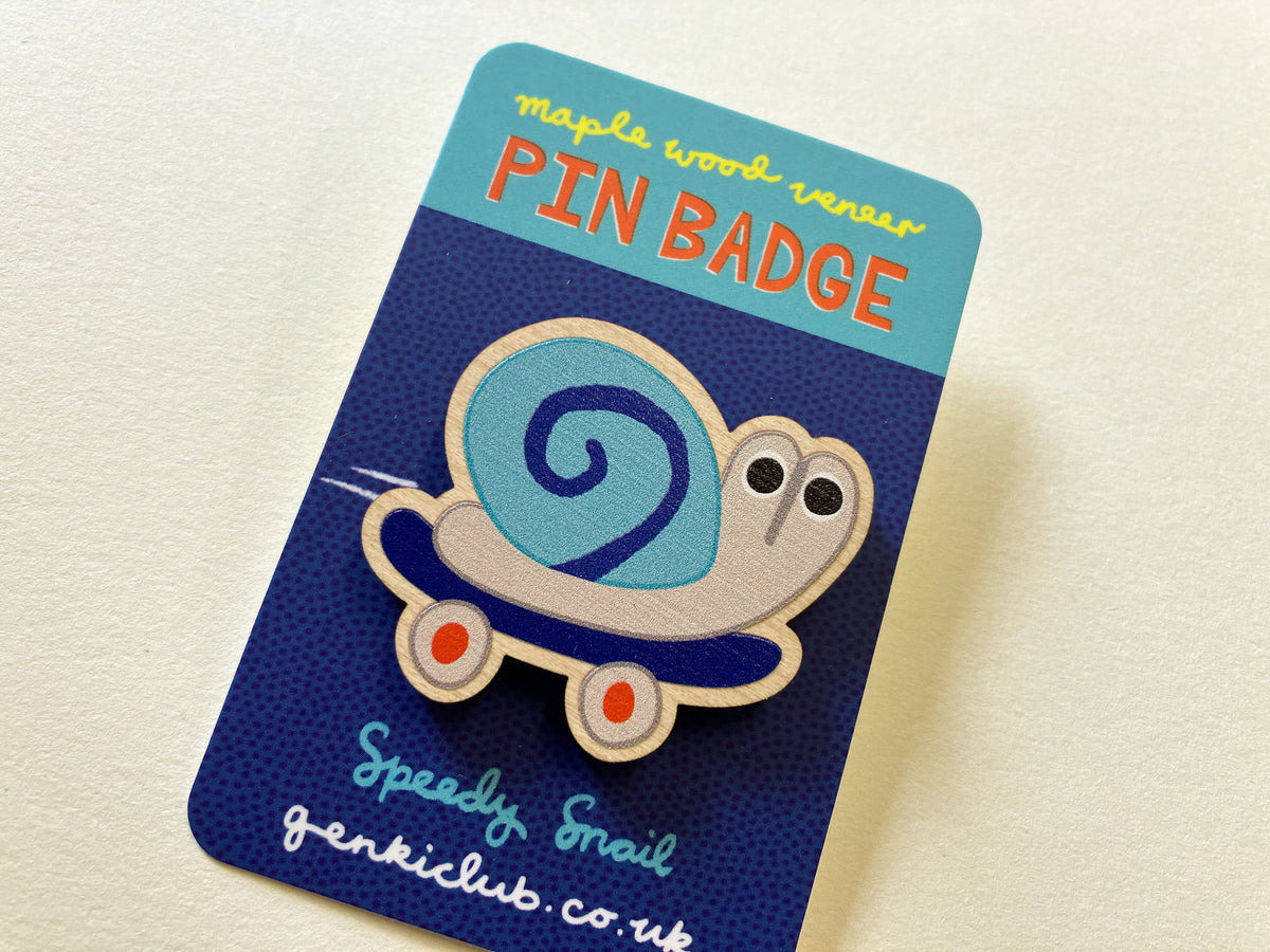 Speedy Snail on a Skateboard Wooden Pin Badge