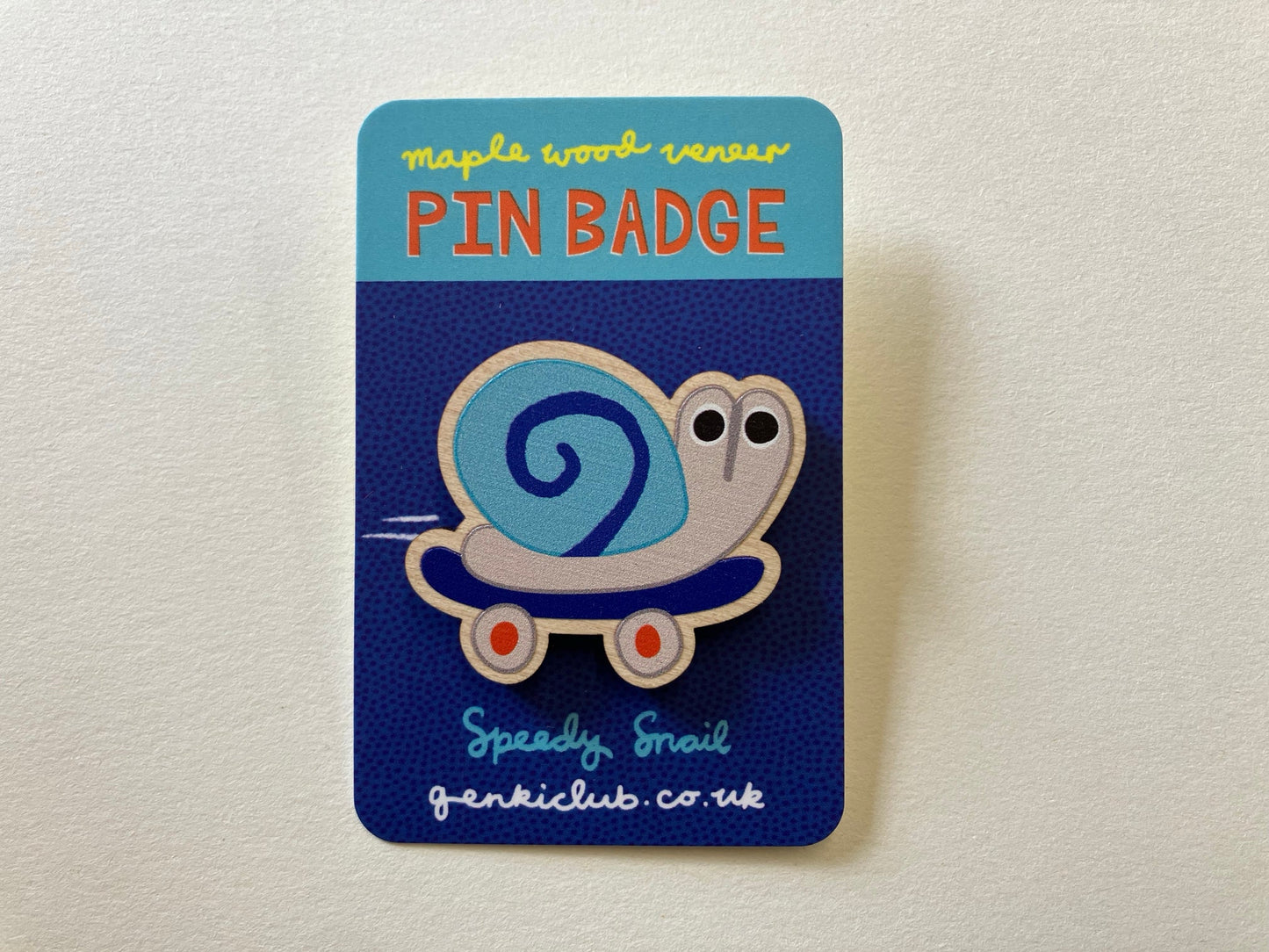 Speedy Snail on a Skateboard Wooden Pin Badge