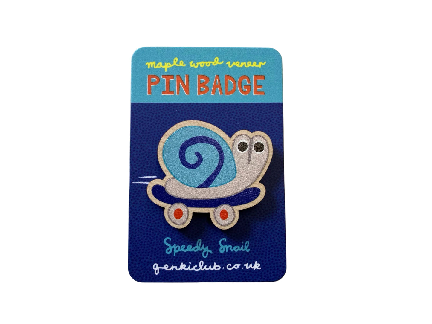 Pin badge with a snail design on a blue card 