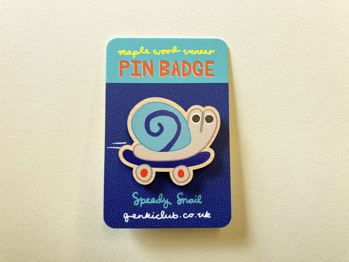 Speedy Snail on a Skateboard Wooden Pin Badge