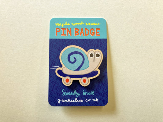 Speedy Snail on a Skateboard Wooden Pin Badge